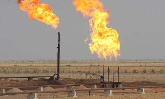 Flames burning off excess gas are seen at Nasiriya oilfield in Nasiriya province, southeast of Baghdad,Iraq.(Reuters File Photo)
