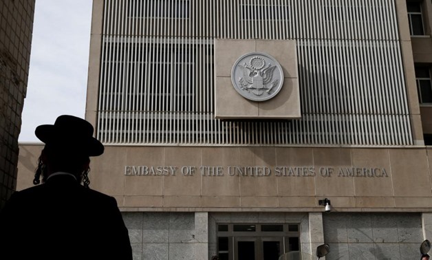 An ultra-Orthodox Jewish man stands in front of the U.S Embassy in Tel Aviv, Israel January 24, 2017. REUTERS/Baz Ratner