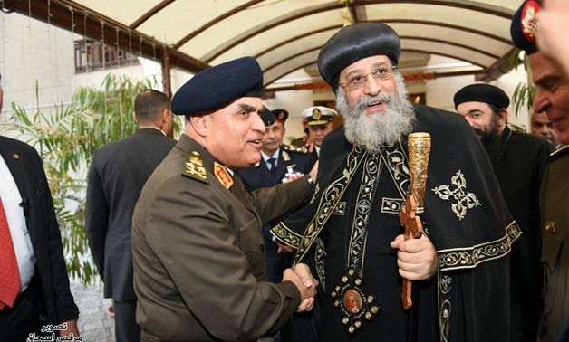 Minister of Defense and Military Production Sedqi Sobhi (L) during his visit to Pope Tawadros of Alexandria and Patriarch of the See of St. Mark (R) at the Coptic Orthodox Cathedral in Abbaseya on January 4, 2018 - Photo by Morkos Ishaq
