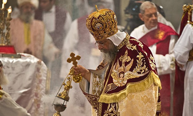 Egyptian Coptic Pope Tawadros II leads the Easter mass at the Saint Mark's Coptic Cathedral - FILE
