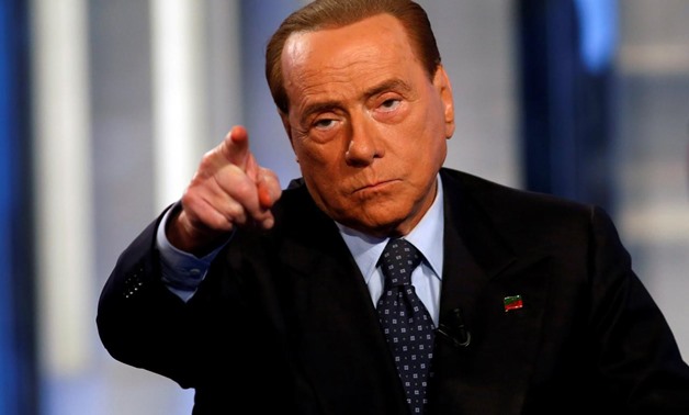  Italy's former Prime Minister Silvio Berlusconi gestures as he attends television talk show "Porta a Porta" (Door to Door) in Rome, Italy, November 30, 2016. REUTERS/Remo Casilli/File Photo