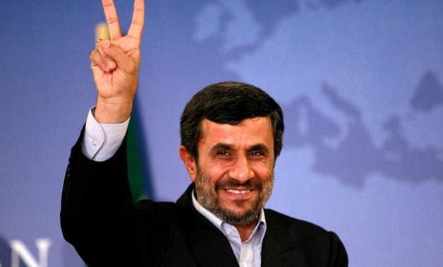 Mahmoud Ahmadinejad gestures as he leaves a news conference in Istanbul, Turkey, May 9, 2011 - REUTERS/Murad Sezer