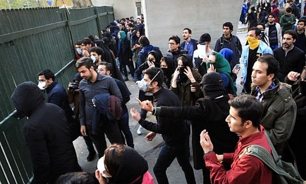 Iranian students protest at the University of Tehran during a demonstration driven by anger over economic problems in the capital, Tehran, December 30, 2017/ AFP/STR