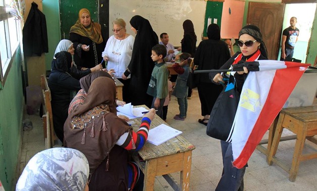 Voters cast their ballots in a polling station during the Egyptian presidential election, May 28, 2014./Egypt Today, Hossam Atef