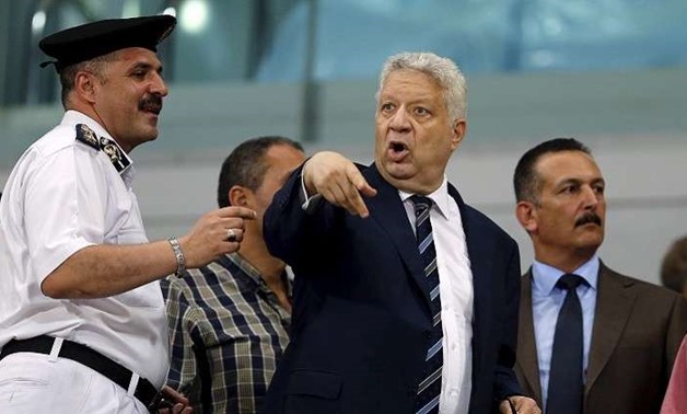 El Zamalek Chairman Mortada Mansour (C) argues with security during their Egyptian Premier League derby soccer match against Al-Ahly at Borg El Arab "Army" Stadium, west of the Mediterranean city of Alexandria, July 21, 2015. REUTERS/Amr Abdallah Dalsh