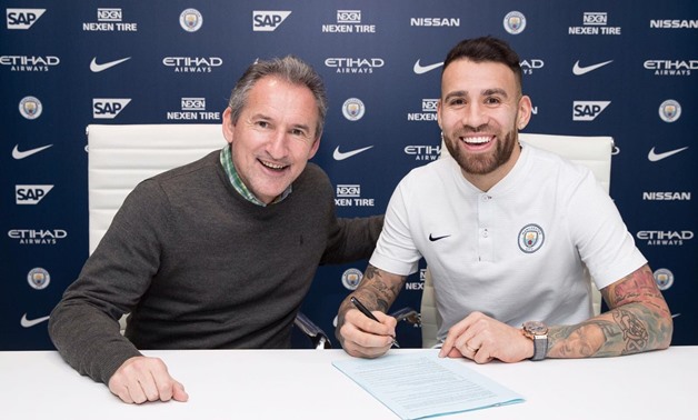 Nicolas Otamendi signs his new contract with Manchester City, Courtesy of Nicolas Otamendi official account on Twitter
