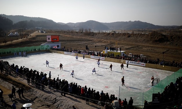 Canadian soldiers and South Korean university students play a friendly Ice Hockey Game during the Imjin Classic 2018 near the demilitarised zone separating the two Koreas in Paju, South Korea, January 19, 2018. REUTERS/Kim Hong-Ji
