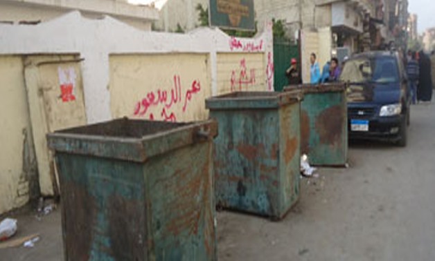 FILE - Trash bins of all sizes have been subject to theft and vandalism in Egypt for years