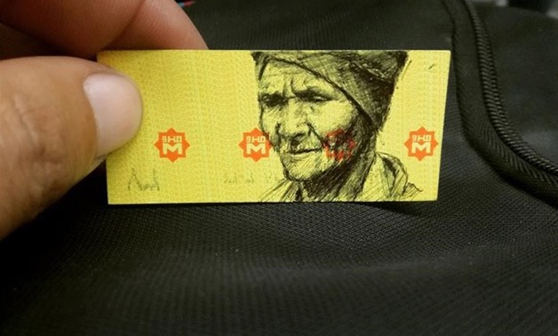 Ahmed Essam’s drawing of an old man on metro tickets - his Facebook page 