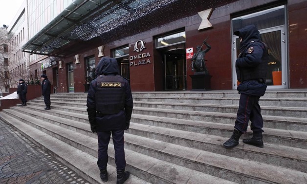 Russian Interior Ministry officers gather outside a building, which houses the office of the Anti-corruption Foundation led by opposition leader Alexei Navalny, before a rally for a boycott of a March 18 presidential election in Moscow, Russia January 28,