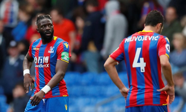 London, Britain - September 16, 2017 Crystal Palace's Luka Milivojevic and Bakary Sako look dejected after the match REUTERS/David Klein