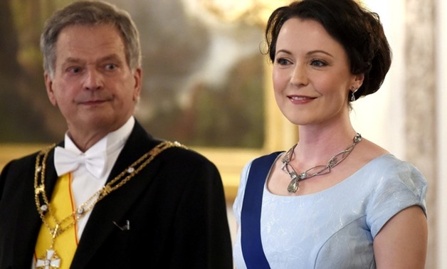 Finland's President Sauli Niinisto and his wife Jenni Haukio look on before a dinner held at the Presidential Castle in Helsinki, Finland, June 1, 2017. Reuters


