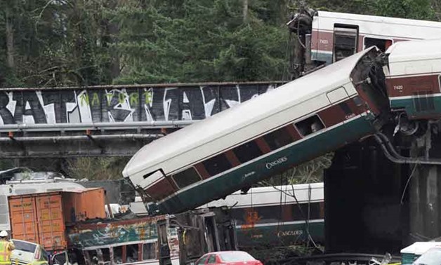 The scene where an Amtrak passenger train derailed on a bridge over interstate highway I-5 in DuPont, Washington, Dec. 18 - REUTERS
