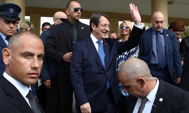 Presidential candidate Nicos Anastasiades leaves the voting center after casting his ballot, during the second round of the presidential election in Limassol, Cyprus February 4, 2018. REUTERS/Yiannis Kourtoglou