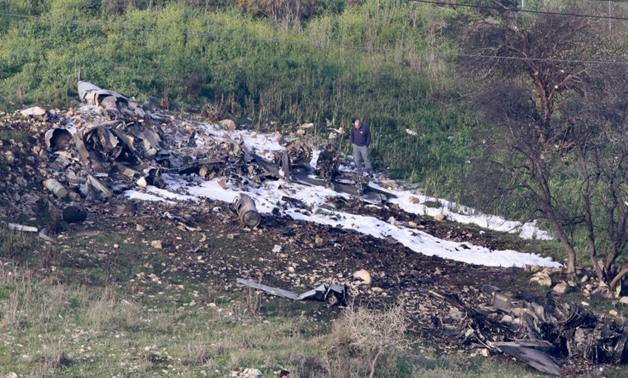 The remains of an F-16 Israeli war plane are seen near the Israeli village of Harduf, Israel February 10, 2018. REUTERS/Herzie Shapira
