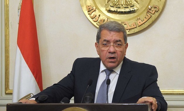 FILE - Minister of Finance Amr el-Garhy