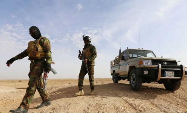 Iraq special forces conduct an operation targeting possible remaining Islamic State (IS) group jihadists in the Wadi Shabjah area, about 180 kms from the holy Shiite city of Najaf. - AFP / Haidar Hamdani
