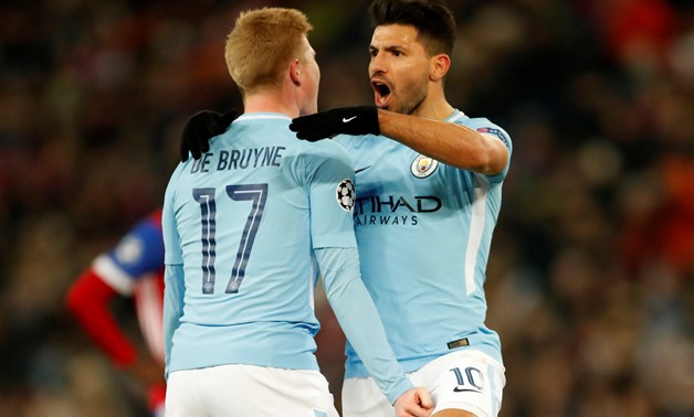 Soccer Football - Champions League - Basel vs Manchester City - St. Jakob-Park, Basel, Switzerland - February 13, 2018 Manchester City's Sergio Aguero celebrates scoring their third goal with Kevin De Bruyne Action Images via Reuters/Andrew Boyers