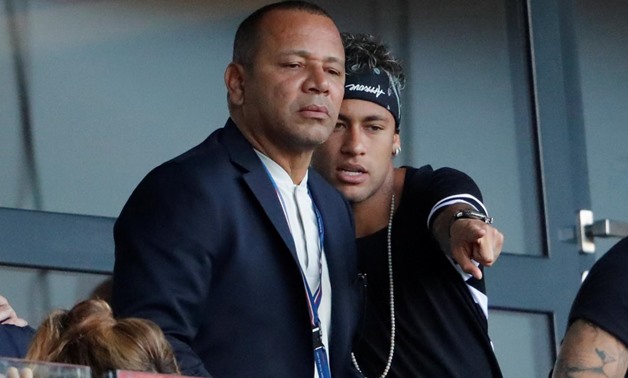 Soccer Football - Paris St Germain vs Amiens SC - Ligue 1 - Paris, France - August 5, 2017 PSG's Neymar watches the game from the stands with his father, Neymar Snr (L) REUTERS/John Schults