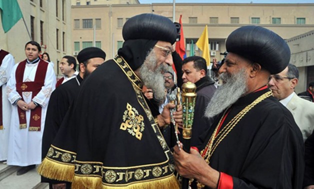 Egypt's Pope Tawadros II greets Ethiopia's Abune Mathias I, Patriarch of the Ethiopian Orthodox Tawahedo Church in a visit to Egypt in 2015 - Press photo