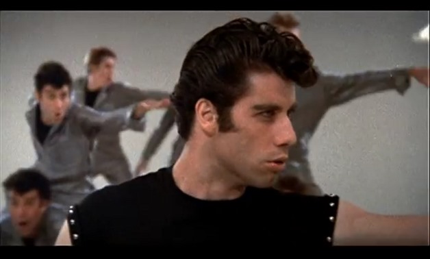 Screencap of John Travolta in the trailer for 'Grease', February 18, 2018 - YouTube/SKYTV