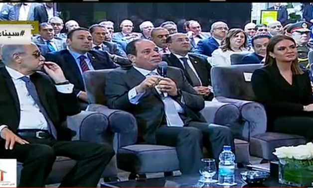 TV Screenshot President Abdel Fatah el-Sisi at the inauguration ceremony with Minister of Investment and International Cooperation Sahar Nasr on February 21, 2018.