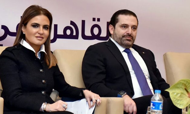 Lebanese Prime Minister Saad Hariri with Egyptian Investment and International Cooperation Minister Sahar Nasr on March 22, 2017 - File photo