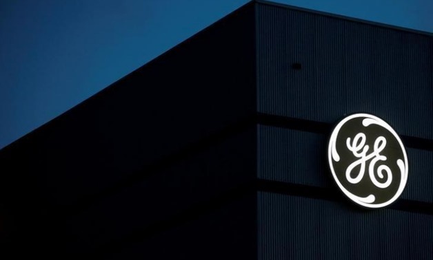 The General Electric logo is pictured on the General Electric offshore wind turbine plant in Montoir-de-Bretagne, near Saint-Nazaire, western France, November 21, 2016. REUTERS/Stephane Mahe/File Photo