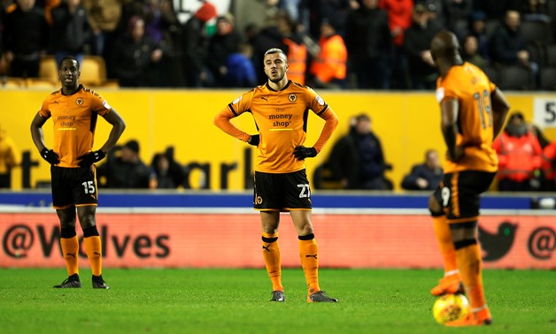 Soccer Football - Championship - Wolverhampton Wanderers vs Norwich City - Molineux Stadium, Wolverhampton, Britain - February 21, 2018 Wolverhampton Wanderers players look dejected Action Images/Craig Brough 