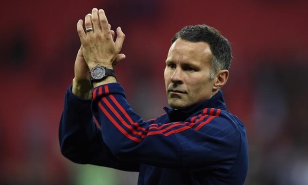 Britain Football Soccer - Crystal Palace v Manchester United - FA Cup Final - Wembley Stadium - 21/5/16 Manchester United assistant manager Ryan Giggs celebrates after winning the FA Cup Reuters / Dylan Martinez

