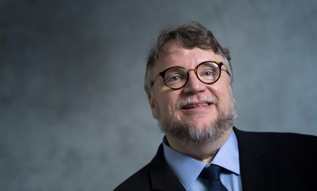 Mexican director Guillermo Del Toro -- shown here in a portrait taken at the Oscar nominees luncheon on February 5 in California -- loved monsters and creatures from a young age