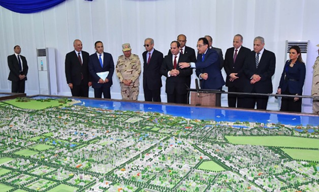 President Abdel Fatah al-Sisi is being updated by minister of Housing Mostafa Madbouly on the project of New city ofAl Alamein in Marsa Matrouh on Thursday, March 1, 2018- press photo