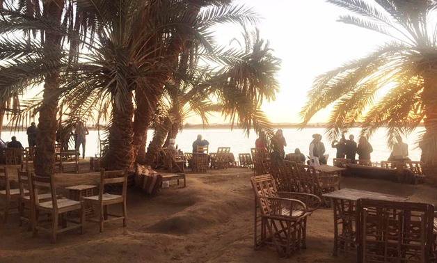 A cafe is seen at Fitnas Island in January 2018 to drink coffee, tea, or smoothies while watching sunset - Egypt Today