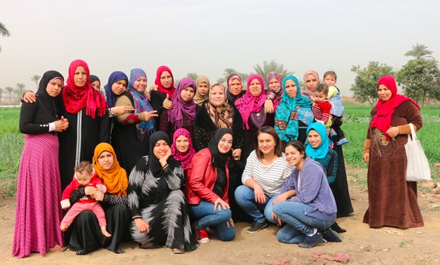 Egypt Today reporters with inspiring Egyptian women after their adult learning class in a Giza village - Egypt Today