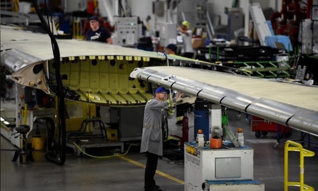 FILE PHOTO: A worker inspects a C Series aeroplane wing in the Bombardier factory in Belfast, Northern Ireland September 26, 2017. REUTERS/Clodagh Kilcoyne
