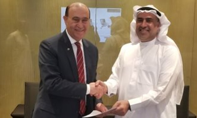 Chairman of Suez Canal Authority Mohab Mamesh and CEO of Saudi National Shipping Company Abdullah Bin Ali Al-Debaikhi - Press Photo
