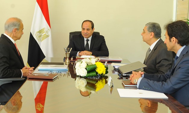 President Abdel Fatah al-Sisi during his meeting with Electricity Mohamed Shaker and prime minister Sherif Ismail on Monday March 12 –Press Photo
