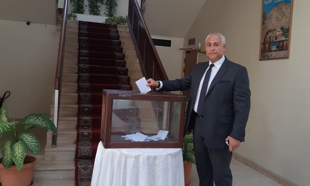 One of the Egyptian community in Bahrain casts his ballot at the embassy in Manama
