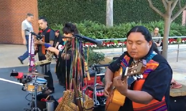 Screencap showcasing Latin folk Bolivian musicians, March 18, 2018 – YouTube/John Chen 