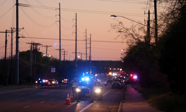 FILE PHOTO: Law enforcement personnel investigate an incident that they said involved an incendiary device in the 9800 block of Brodie Lane in Austin, Texas, U.S., March 20, 2018.REUTERS/Loren Elliott