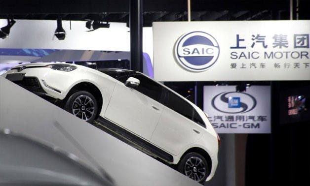 SAIC Motor Corp's logos are pictured at its booth during the Auto China 2016 auto show in Beijing, China April 26, 2016 - REUTERS/Kim Kyung-Hoon/File Photo