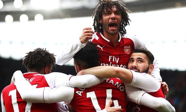 Mohamed el-Nenny celebrates with his Arsenal teammates – Press image courtesy of Arsenal’s official website