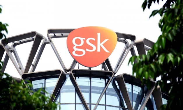 FILE PHOTO: The GlaxoSmithKline (GSK) logo is seen on top of GSK Asia House in Singapore, March 21, 2018. Picture taken March 21, 2018. REUTERS/Loriene Perera/File Photo
