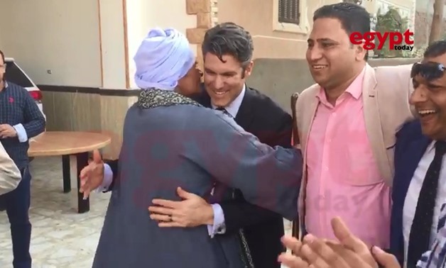 Members of American delegation appeared dancing with voters outside polling stations in Menoufia governorate, north of Egypt, Tuesday 27 March – photo courtesy of Twitter  