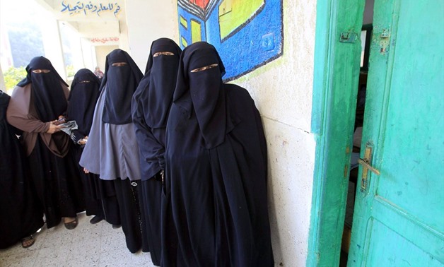 Niqab-clad women line up to vote in presidential election-AFP