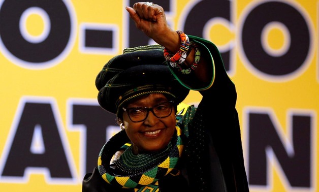 FILE PHOTO: Winnie Madikizela Mandela, ex-wife of former South African president Nelson Mandela, gestures to supporters at the 54th National Conference of the ruling African National Congress (ANC) at the Nasrec Expo Centre in Johannesburg, South Africa D