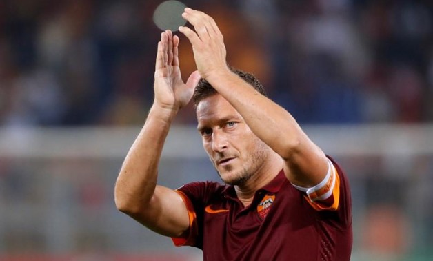 FILE PHOTO AS Roma's Francesco Totti claps at the end of their Champions League Group E soccer match against CSKA Moskow at the Olympic Stadium in Rome September 17, 2014. AS Roma won 5-1. REUTERS/Alessandro Bianchi/File Photo 