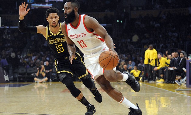 April 10, 2018; Los Angeles, CA, USA; Houston Rockets guard James Harden (13) moves the ball against Los Angeles Lakers guard Josh Hart (5) during the first half at Staples Center. Mandatory Credit: Gary A. Vasquez-USA TODAY Sports
