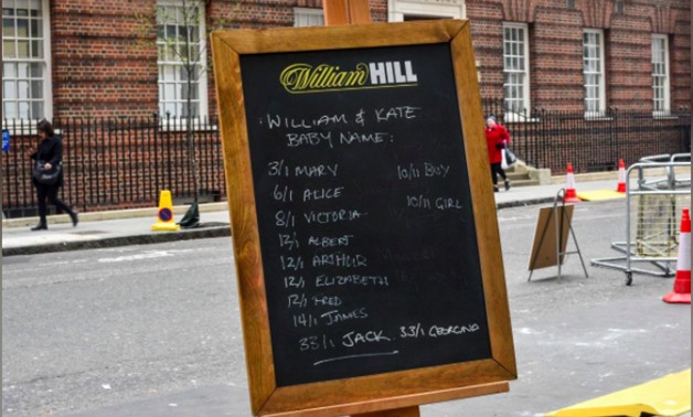 The names and betting odds for the third royal baby of Britain's Prince William and Catherine, Duchess of Cambridge, can be seen written on a board outside the Lindo Wing St Mary's Hospital in west London, Britain, April 13, 2018. REUTERS/Peter Summers