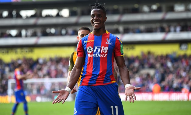 Soccer Football - Premier League - Crystal Palace vs Brighton & Hove Albion - Selhurst Park, London, Britain - April 14, 2018 Crystal Palace's Wilfried Zaha celebrates after the match REUTERS/Dylan Martinez 